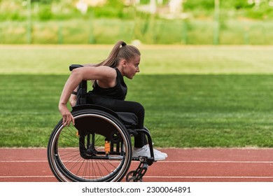 A woman with disablity driving a wheelchair on a track while preparing for the Paralympic Games - Powered by Shutterstock