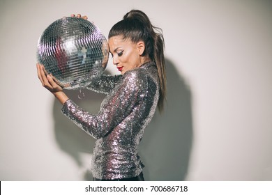 Woman With Disco Ball 