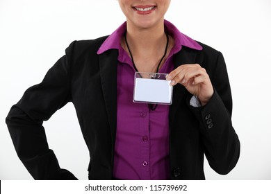 Woman Displaying Visitor Badge