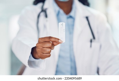 Woman, Doctor And Hand With Negative Corona Medical Test Result In The Hospital. Testing During The Pandemic Virus To Stop Covid 19 And In A Healthcare Clinic For Safety, Security And Wellness