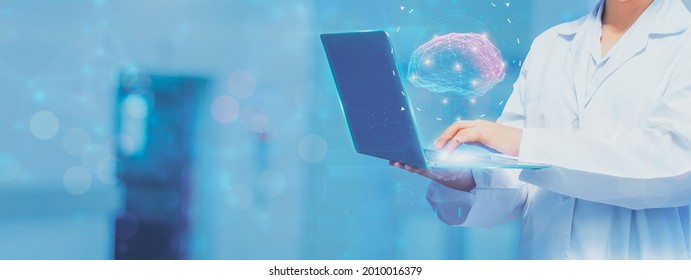 Woman Doctor Holding Futuristic Computer With Virtual Screen Interface Holographic Digital Brain On Laptop,concept Digital Healthcare Connection And Medical Innovative Technology And Science