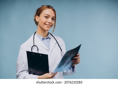 Woman Doctor Looking At Xray Picture