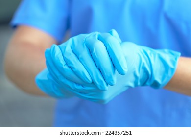 woman doctor in medical gloves  - Shutterstock ID 224357251