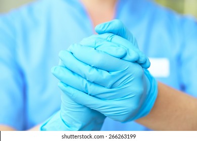 Woman Doctor In Medical Gloves 