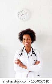 Woman Doctor Standing With Stetoscope Over Her Neck