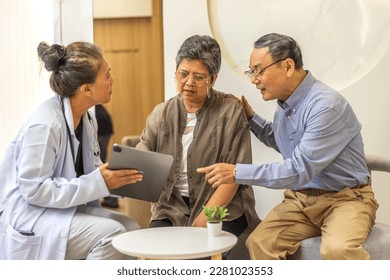 Woman doctor with stethoscope help support discussing and consulting care talk to sick senior asian woman patient in hospital,caregiver,elderly,recovery,illness insurance.healthcare and medicine - Shutterstock ID 2281023553