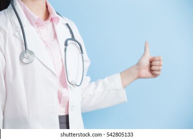 Woman Doctor Thumb Up Isolated On Blue Background,asian