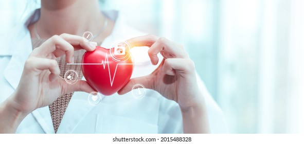 Woman Doctor In White Uniform Holding Red Medical Heart, Pulse Check Cardiology With Icon Symbol Treatment, Diagnosis Healthy Concept.