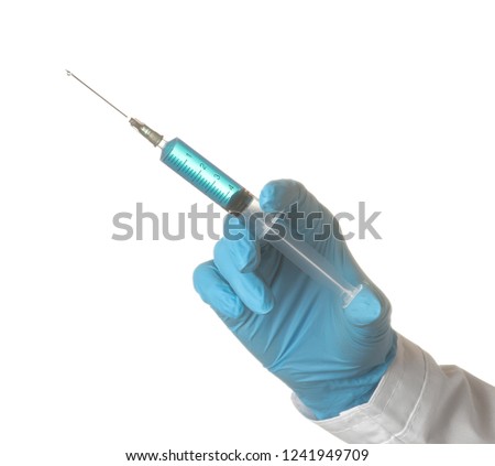 Woman doctor's hand is holding a syringe on a white isolated background. hand gestures