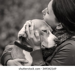 Woman And Dog Tender Hugs