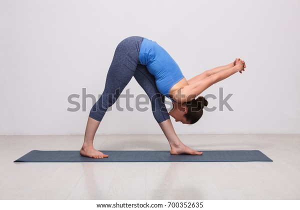 Woman Doing Ashtanga Vinyasa Yoga Asana Stock Photo Edit Now