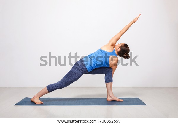 Woman Doing Ashtanga Vinyasa Yoga Asana Stock Photo Edit Now