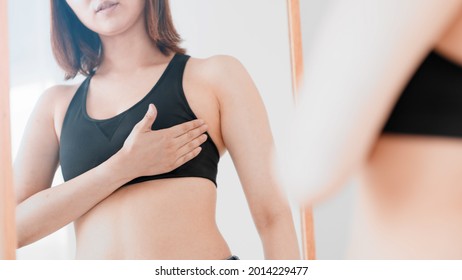 Woman doing chest self massage