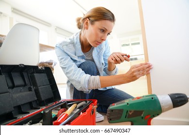 Woman Doing DIY Work At Home