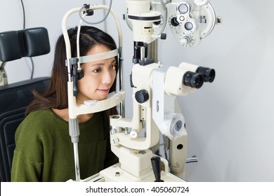 Woman Doing Eye Test 