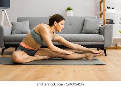Woman Doing Fitness Stretching Exercise Workout At Home - Shutterstock ID 1940054149