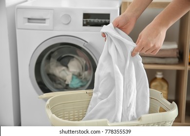 Woman Doing Laundry At Home