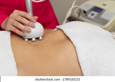 Woman Doing Lipo At The Beautician. Spa Concept