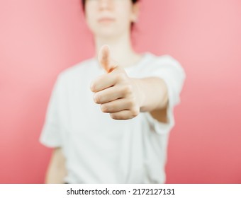 Woman Doing The Ok All Good Sign To Camera Over A Pink Background, Help And Self Help Concept, Mental Health. Good New Concept, Be Happy.