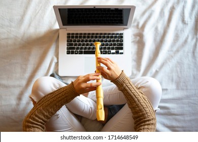 Woman Doing An Online Music Class At Home. Online Music Classes Concept.