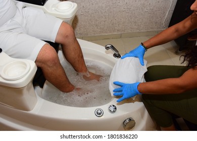 A Woman Doing A Pedicure