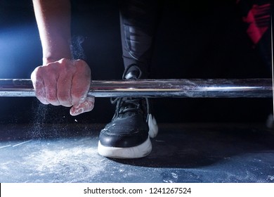 Woman Doing Power Lifting Training In Gym