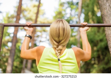 Woman Doing Pullups