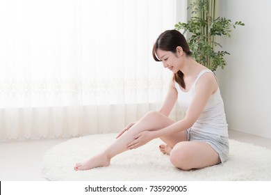 Woman Doing Self Massage, Calves, Foot