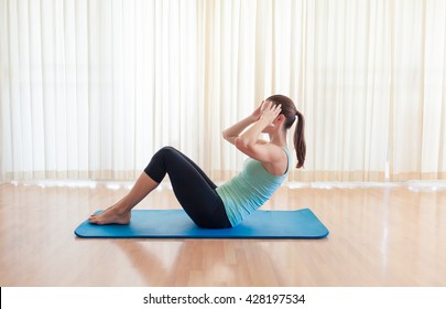 Woman Doing Sit Up.