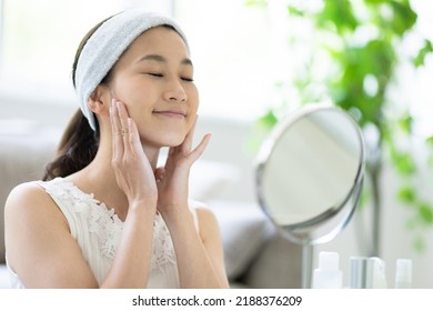 Woman Doing Skin Care In The Room