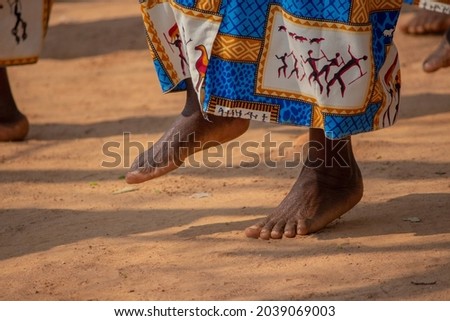 Woman doing traditional dances barefoot