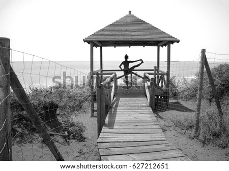 Similar – Image, Stock Photo Little girl jumping on a path of wooden boards in a wetland