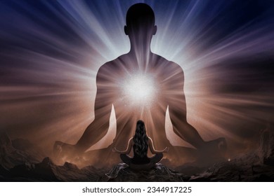 Woman doing yoga in front of giant silhouette of man with universe - Shutterstock ID 2344917225