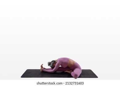 Woman Doing Yoga - Head To Knee Pose - Janu Sirsasana