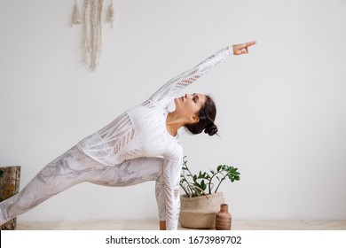 Woman Are Doing Yoga In Home.