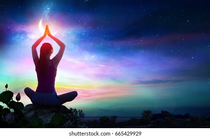 Woman Doing Yoga With Lotus Flowers And Chakra Gradient Colors - Spiritual Contemplation 
 - Shutterstock ID 665429929
