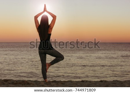 Similar – Women doing pilates on the beach