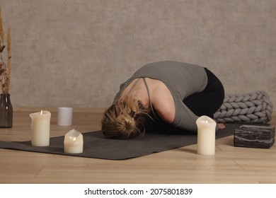 Woman Doing Yoga Pain Relief Stretching At Home. Self Care, Healing Concept