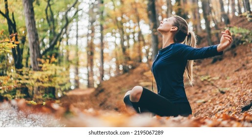 Woman doing yoga pose in peaceful natural forest. Lifestyle and Meditation concept.  - Powered by Shutterstock