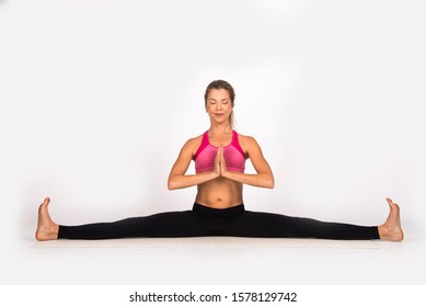 Woman Doing Yoga Poses, Girl In Studio, Isolated On White. Fitness Yoga Instructor 