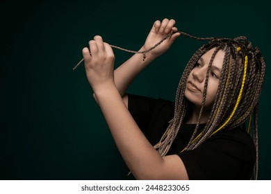 Woman With Dreadlocks Holding Scissors - Powered by Shutterstock