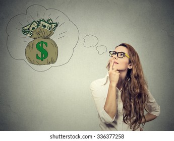 Woman dreaming of financial success 