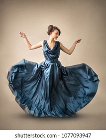 Woman Dressing A Floating Blue Dress