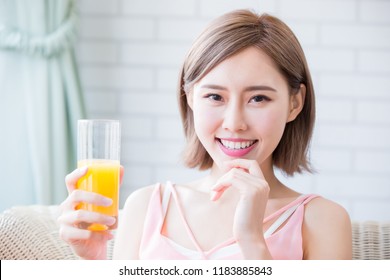 Woman Drink Juice And Feel Happily At Home