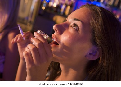 Woman Drinking In Bar