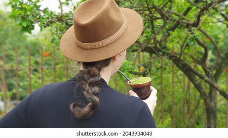 A Woman Drinking Chimarrao. Typical Drink Of The Gaucho People, Southern Brazil.	