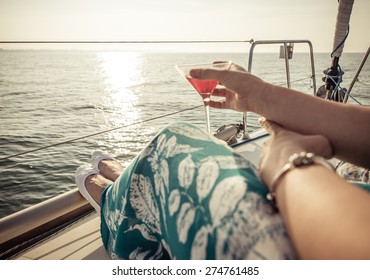 Woman Drinking Cocktail On The Boat. Concept About Leisure, Summer, Vacations And People