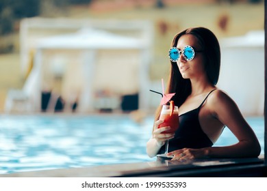 Woman Drinking A Cocktail In The Pool During Summer Vacation
Female Tourist Enjoying Pool Party In Summertime Luxury Resort
