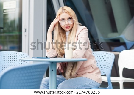 woman drinking coffee in the morning at restaurant. 
