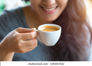 Woman Drinking Espresso At Coffee Cafe.